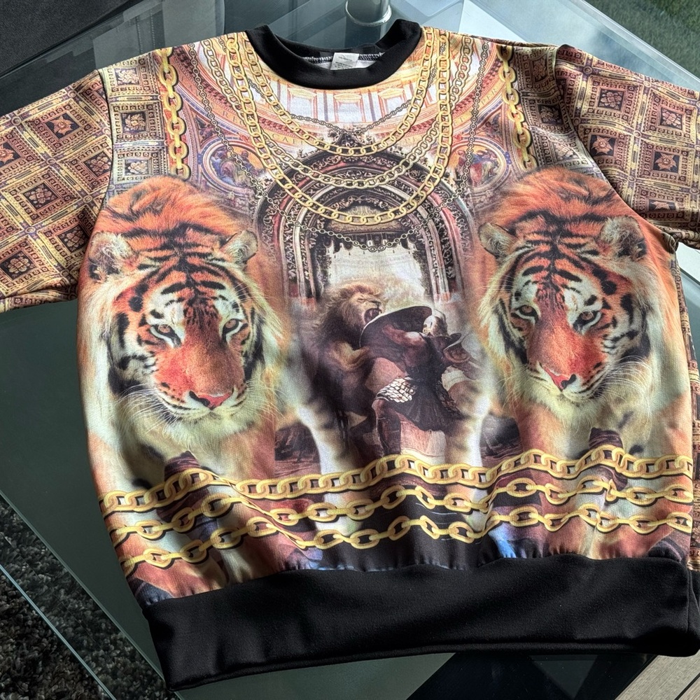 Black and Gold Men’s Pullover. Worn only once and in great condition.